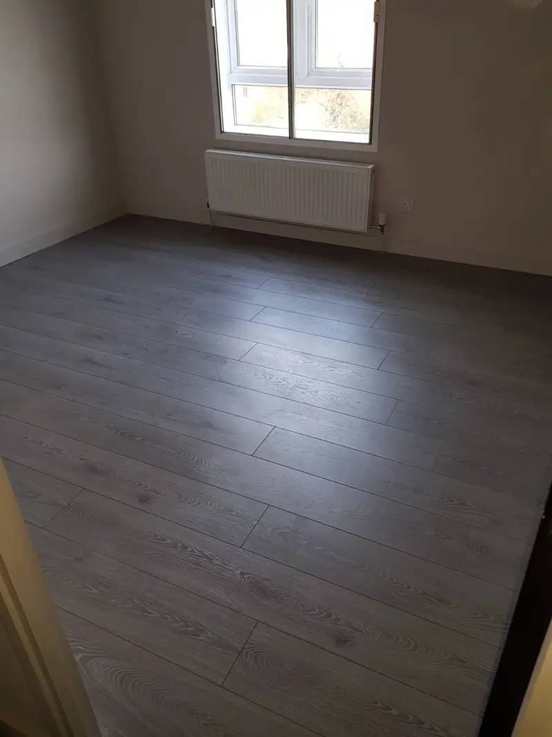 Dark hardwood flooring installation