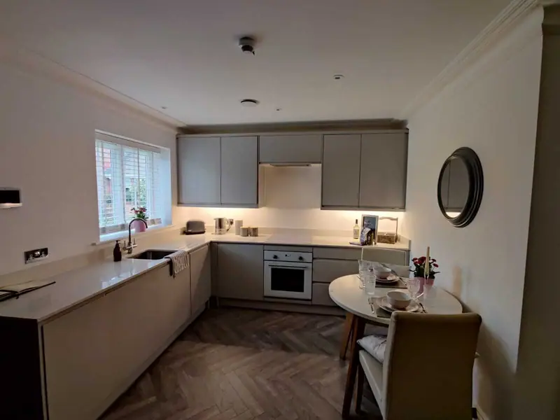 Fitted kitchen with dining area installed by Kalmar Building Services